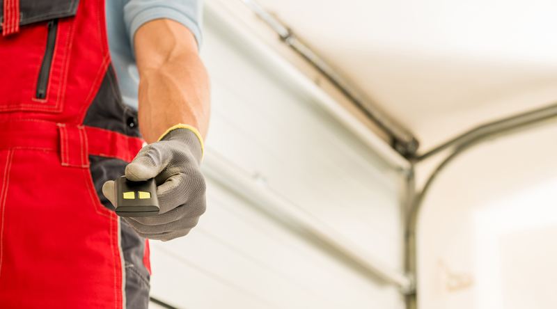 Technician installing a garage door
